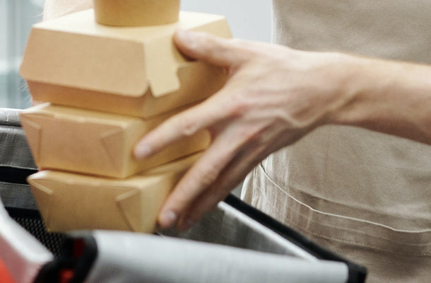 A picture showing food packages being delivered